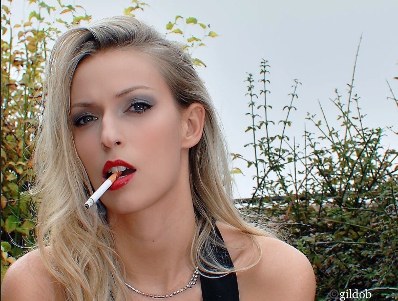 Women Smoking Cigarettes — 21